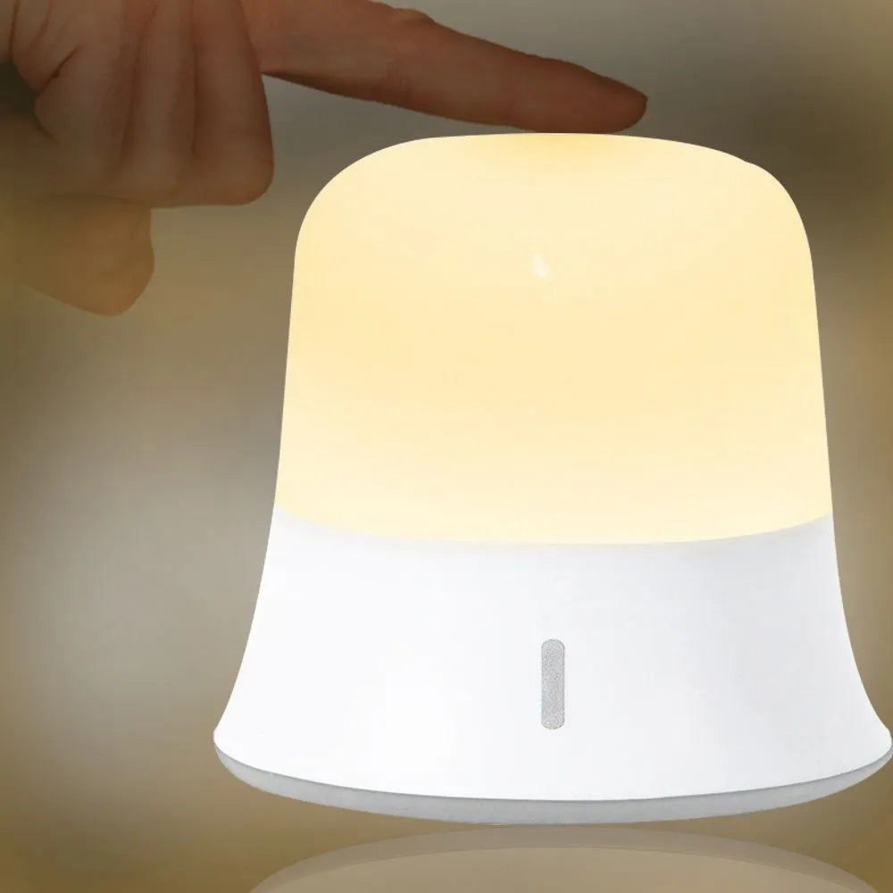 White bedside nursing night light with touch controls for dimming and colour adjustment