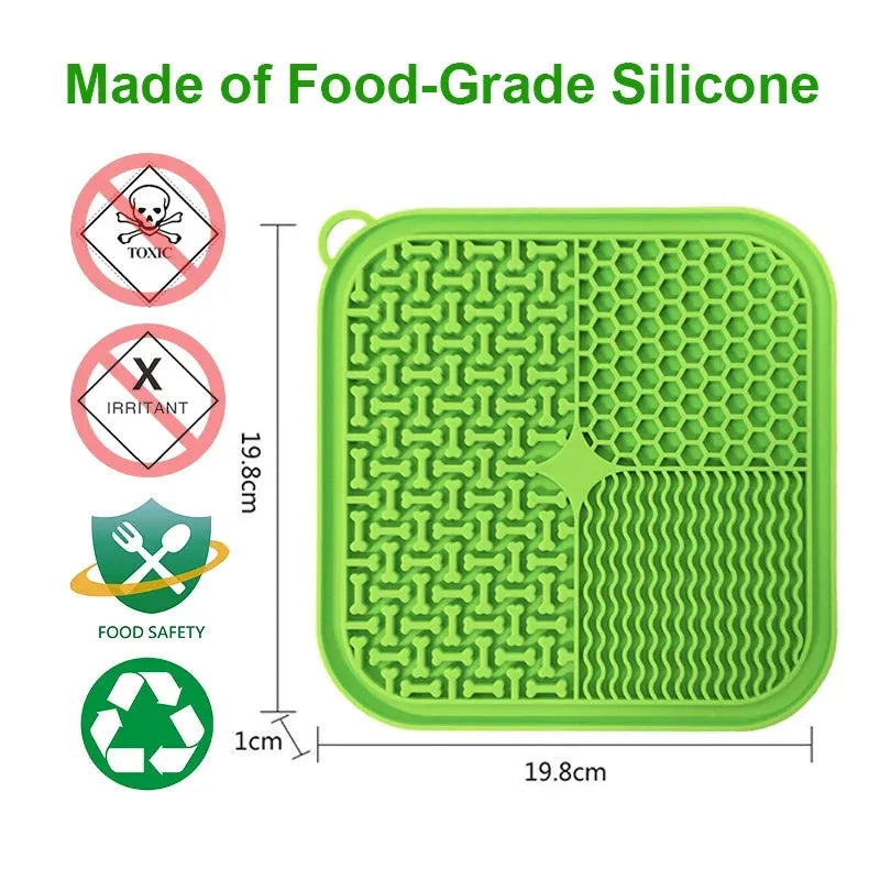 Orange red silicone dog licking mat with suction cups on back for slow feeding and anxiety relief