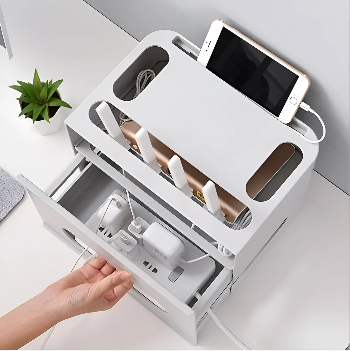 Plastic wireless router storage box in grey or white, wall-mountable cable organiser for home office