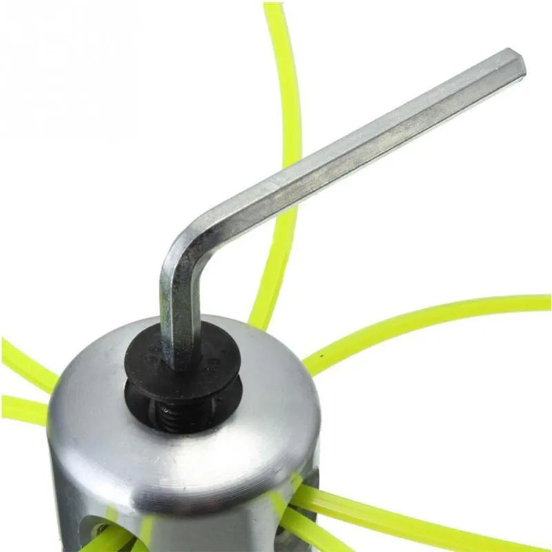 Silver aluminium lawn mower trimmer head with light yellow square grass strings and a wrench
