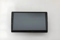 10.1 inch universal Android car stereo with trapezoidal touchscreen display and GPS antenna