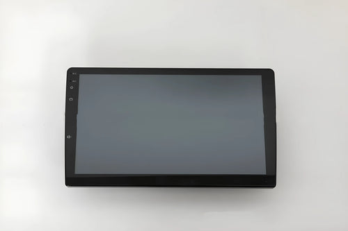 10.1 inch universal Android car stereo with trapezoidal touchscreen display and GPS antenna