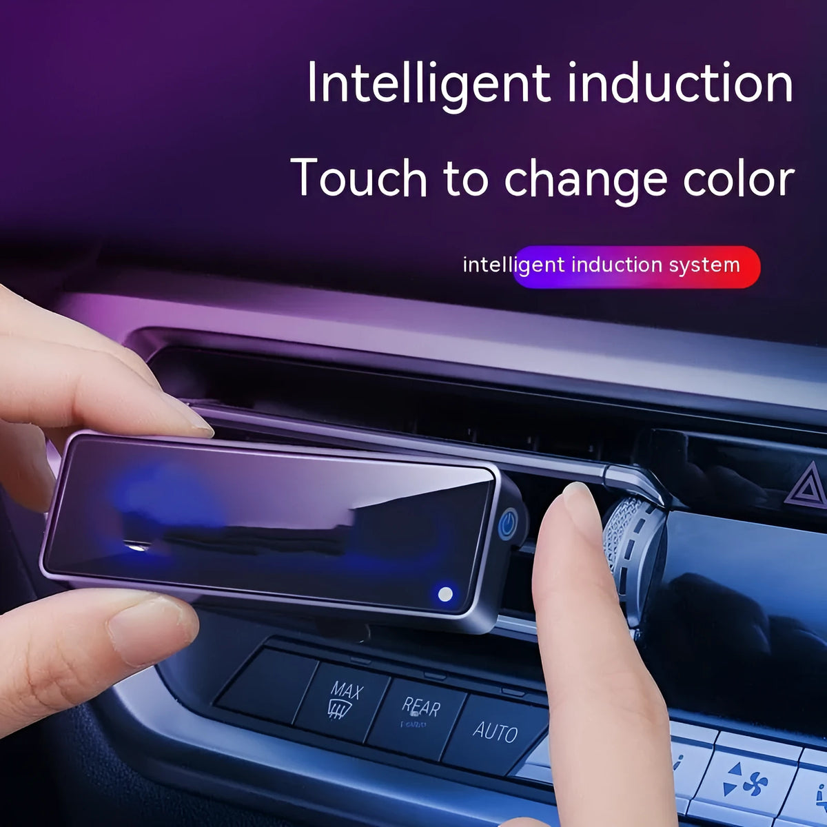 Black automobile aromatherapy air outlet ambience light with LED illumination on car dashboard