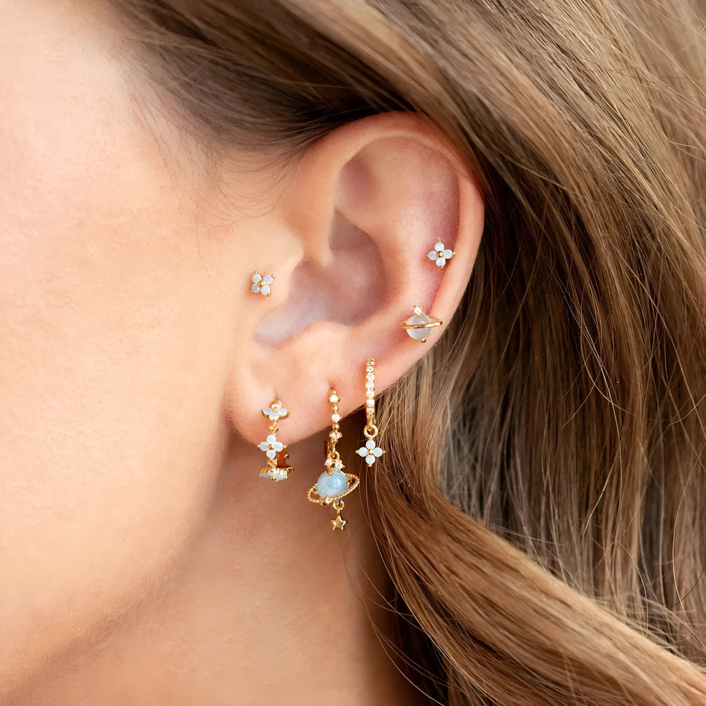 Gold and silver Japanese Korean style flower ear studs with blue flower nail and zircon mosaic design.