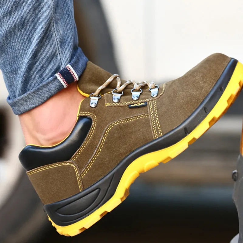 Bronze cow suede leather men's safety boots with a steel toe cap and patterned non-slip sole.