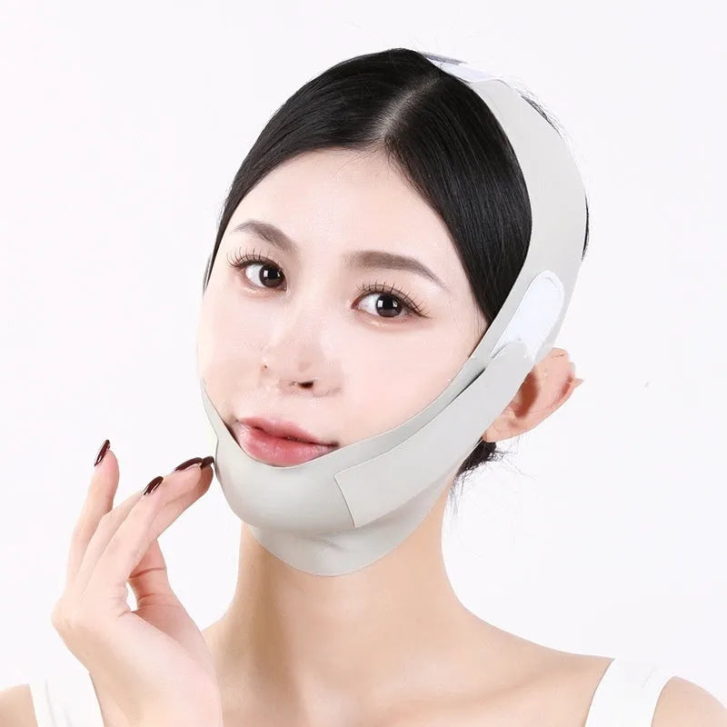 Small V face shaping mask in light breathable fabric, shown in purple and green colours.