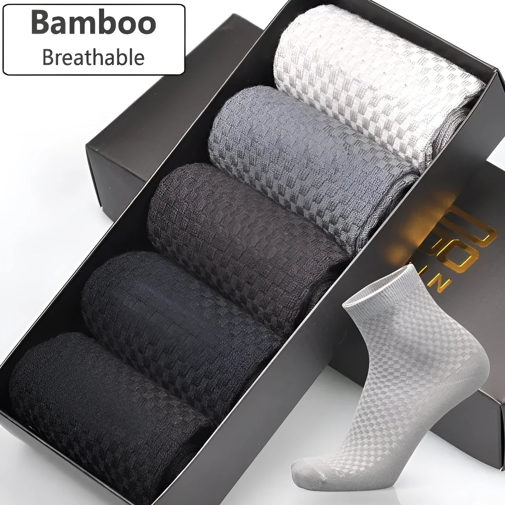 Men's black bamboo fibre socks with small square pattern on ankle