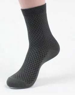 Men's black bamboo fibre socks with small square pattern on ankle
