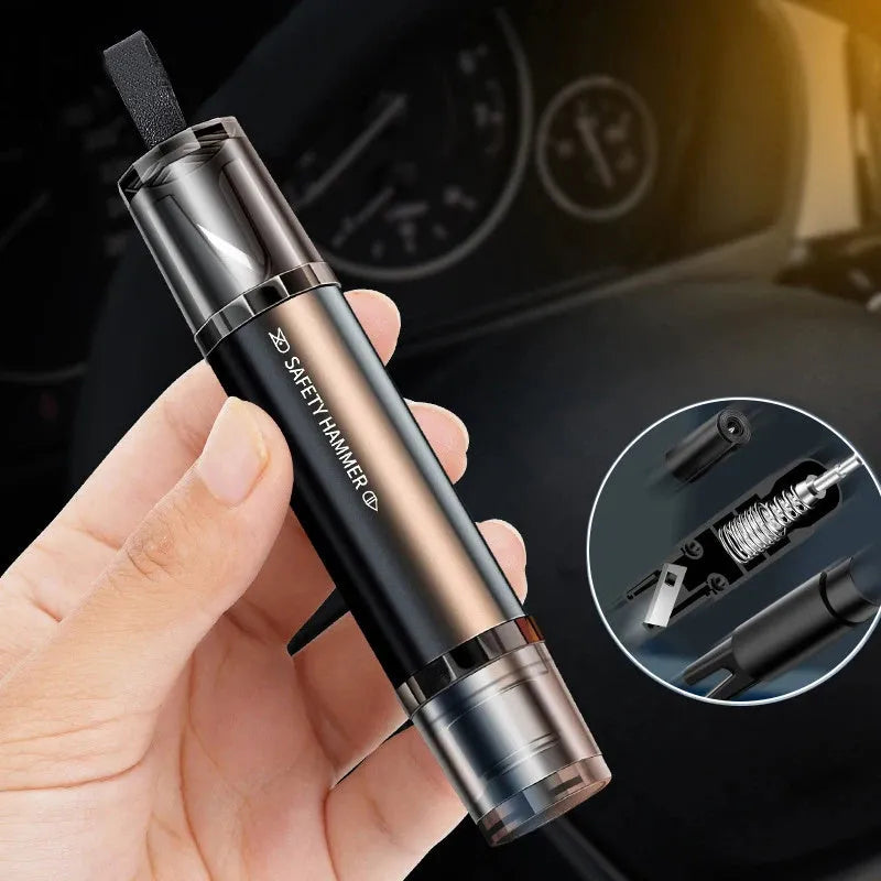 Black and red car safety hammer with tungsten steel window breaker tip and hidden seat belt cutter