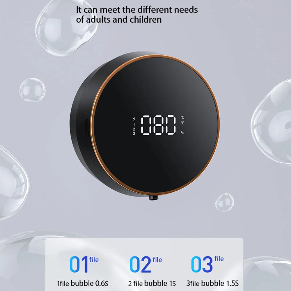 Automatic sensor foam soap dispenser in black mounted on a bathroom wall.