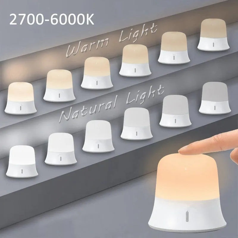 White bedside nursing night light with touch controls for dimming and colour adjustment