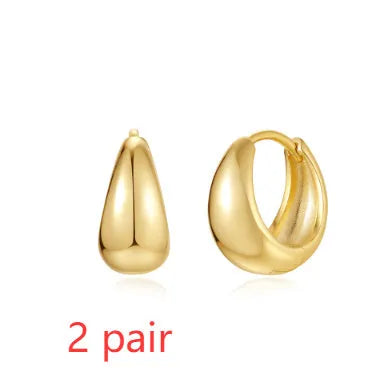 Geometric brass earclip earrings with round design in gold electroplated finish