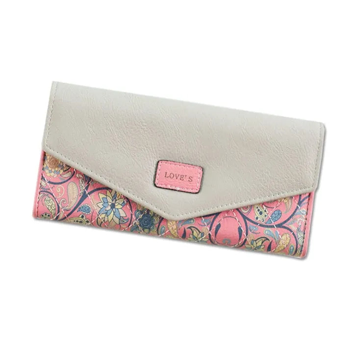 Women's black PU leather trifold wallet showing buckle closure and measuring 19.5cm