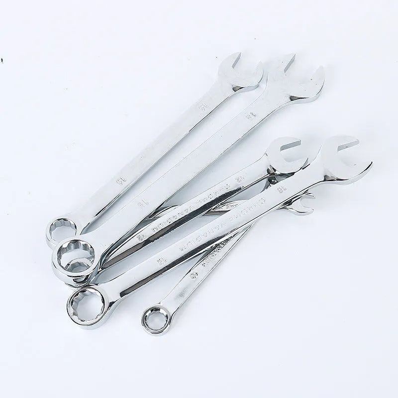 Open box of a 61-piece chrome vanadium steel socket wrench set with ratchets, sockets, and extension bars.
