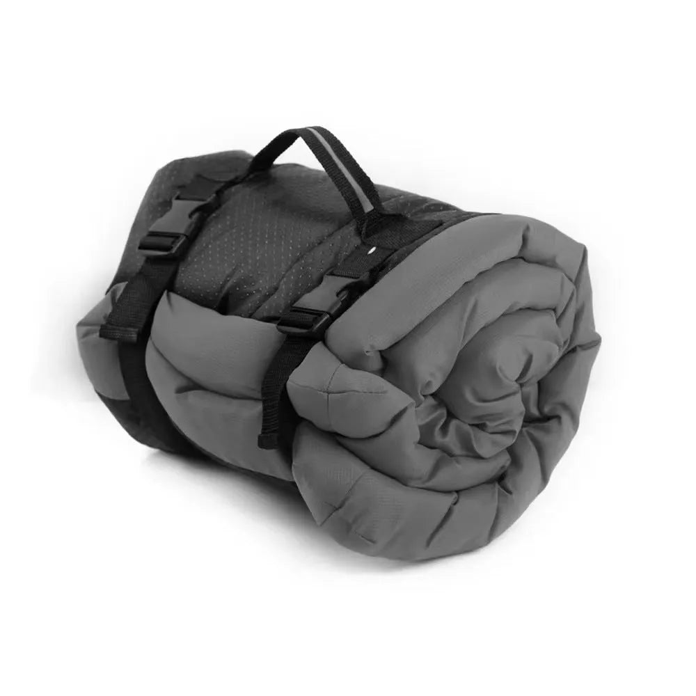 Blue foldable waterproof dog bed with nylon buckles, shown both open and compacted.