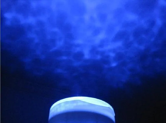Blue coloured ocean theme LED projection lamp for children's rooms.