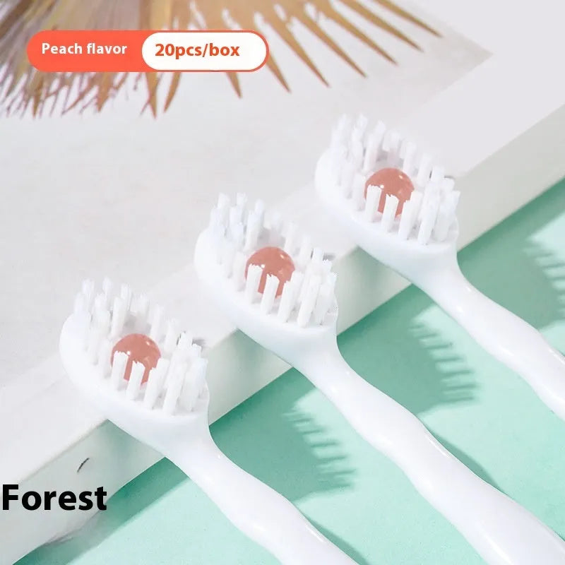 Box of 20 Bead disposable toothbrushes with integrated toothpaste in mint, peach, and plum green tea flavours.