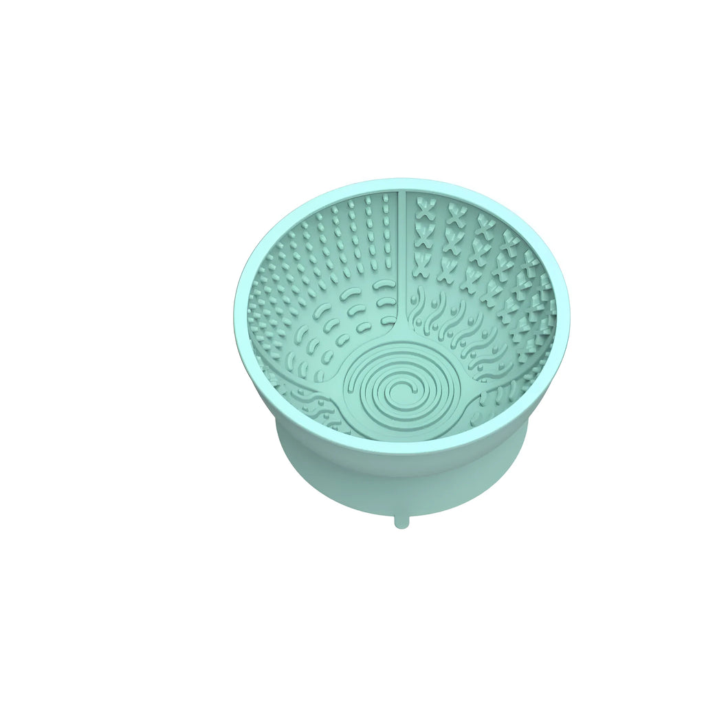 Cyan silicone dog slow feeder bowl with suction cup base and textured interior