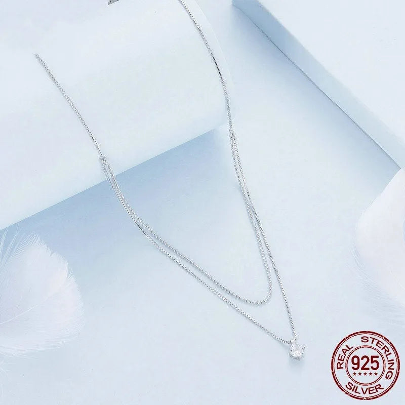 S925 sterling silver double-layer necklace with pearl chain in silver colour.