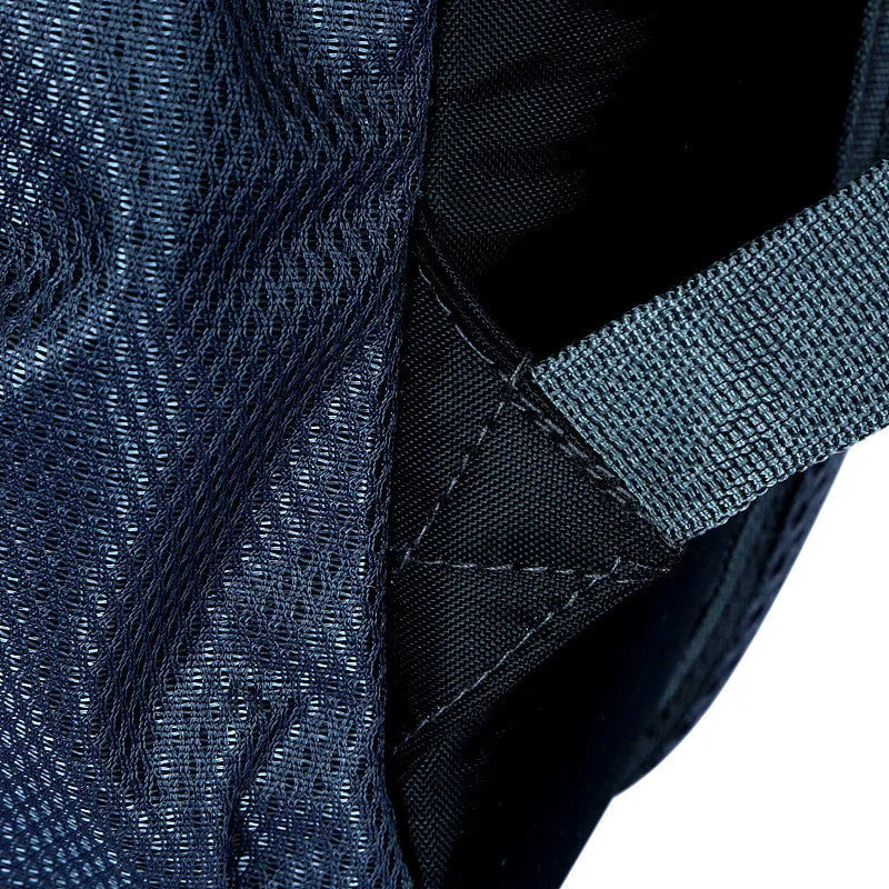 Large Oxford cloth travel backpack showing computer compartment, measuring 31cm wide by 51cm high by 19cm deep
