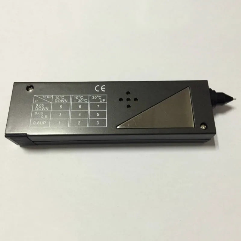 Black portable thermal conductivity meter for diamond testing with metal probe, showing dimensions.