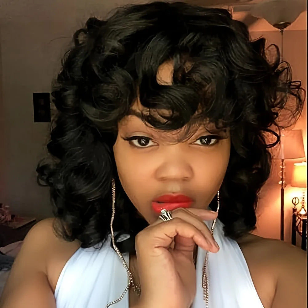 A woman wearing a long, black synthetic wig with tight Afro-textured curls.