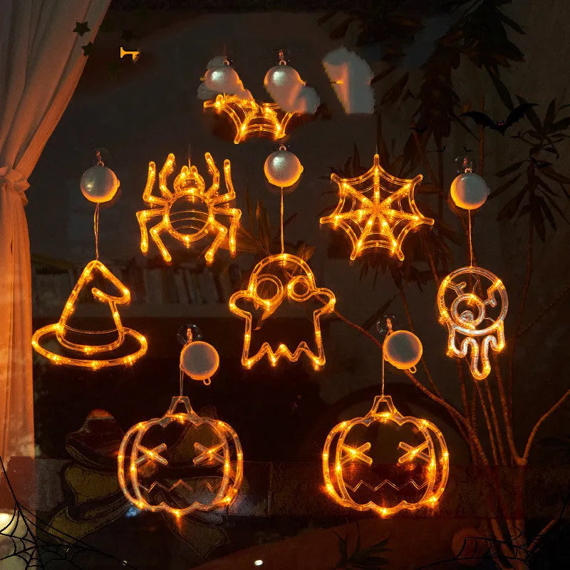 Halloween window hanging LED lights set with spider, pumpkin, and ghost decorations on suction cups