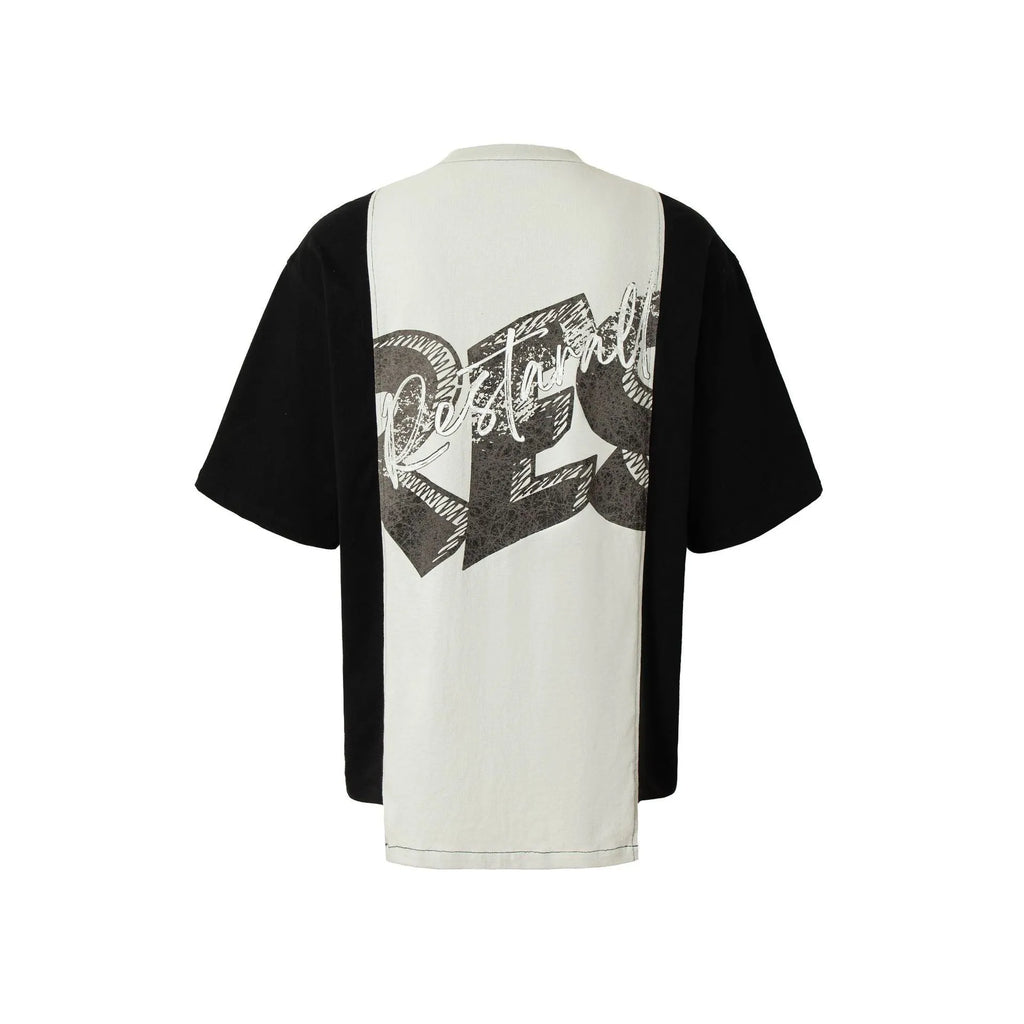 Black and white deconstruction print cotton blend loose T-shirt on a hanger.