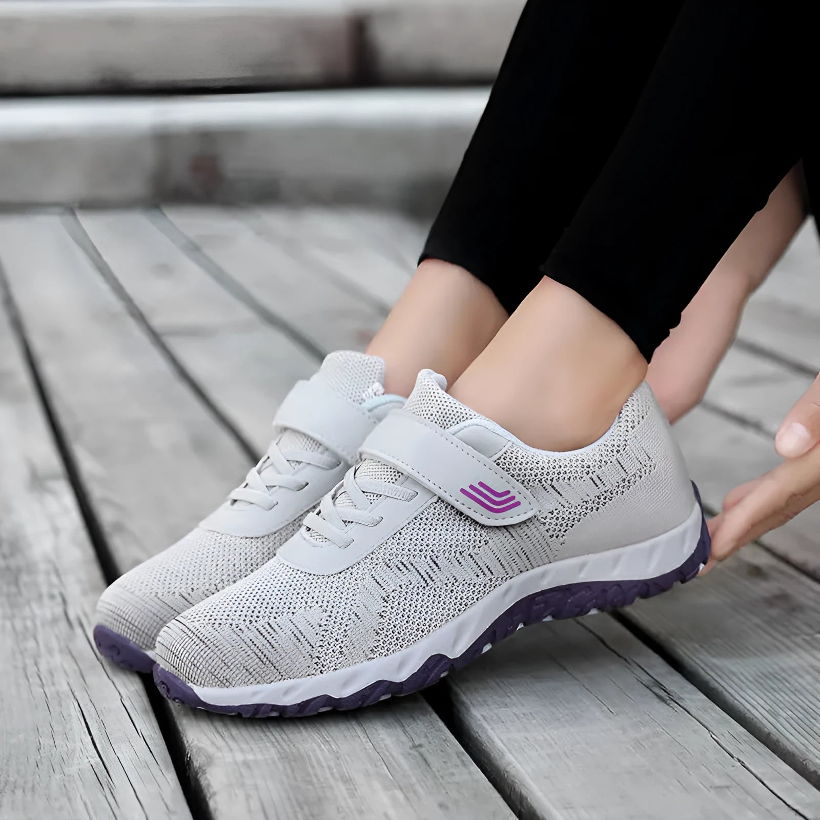 Women's grey purple wedge heel shoes with a mesh upper and velcro strap fastening.