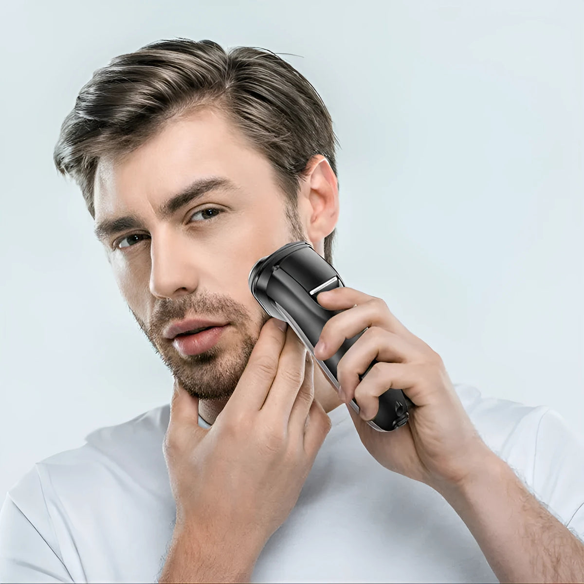 Men's electric shaver kit with three rotating floating heads and pop-up sideburn trimmer