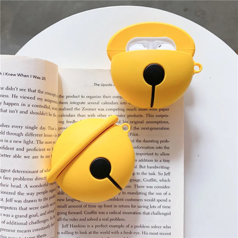 Yellow silicone AirPods case with attached bell for 1st and 2nd generation charging cases