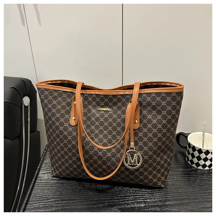 Western style shoulder bag in PU leather with sewing thread detail showing black colour option