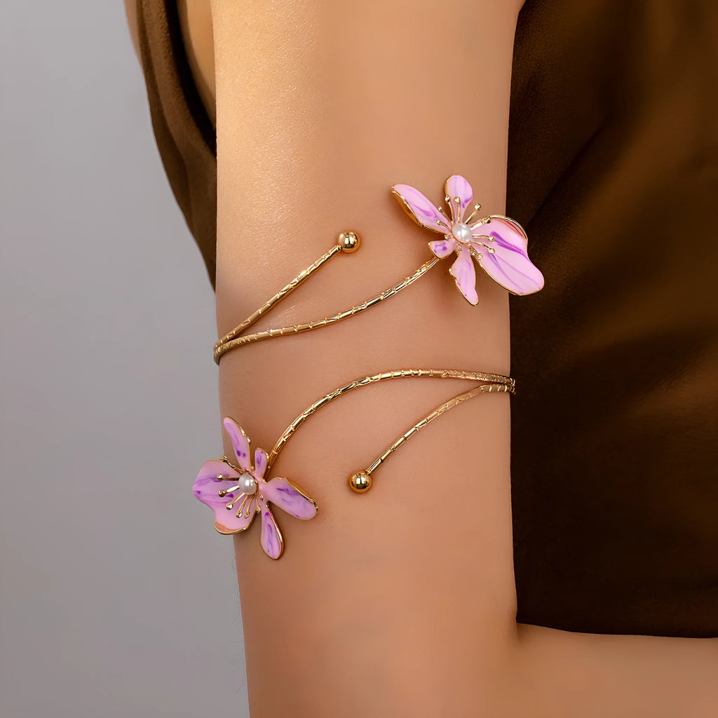 Pink alloy armband jewellery with hollow pattern design lines for fashion wrist accessory