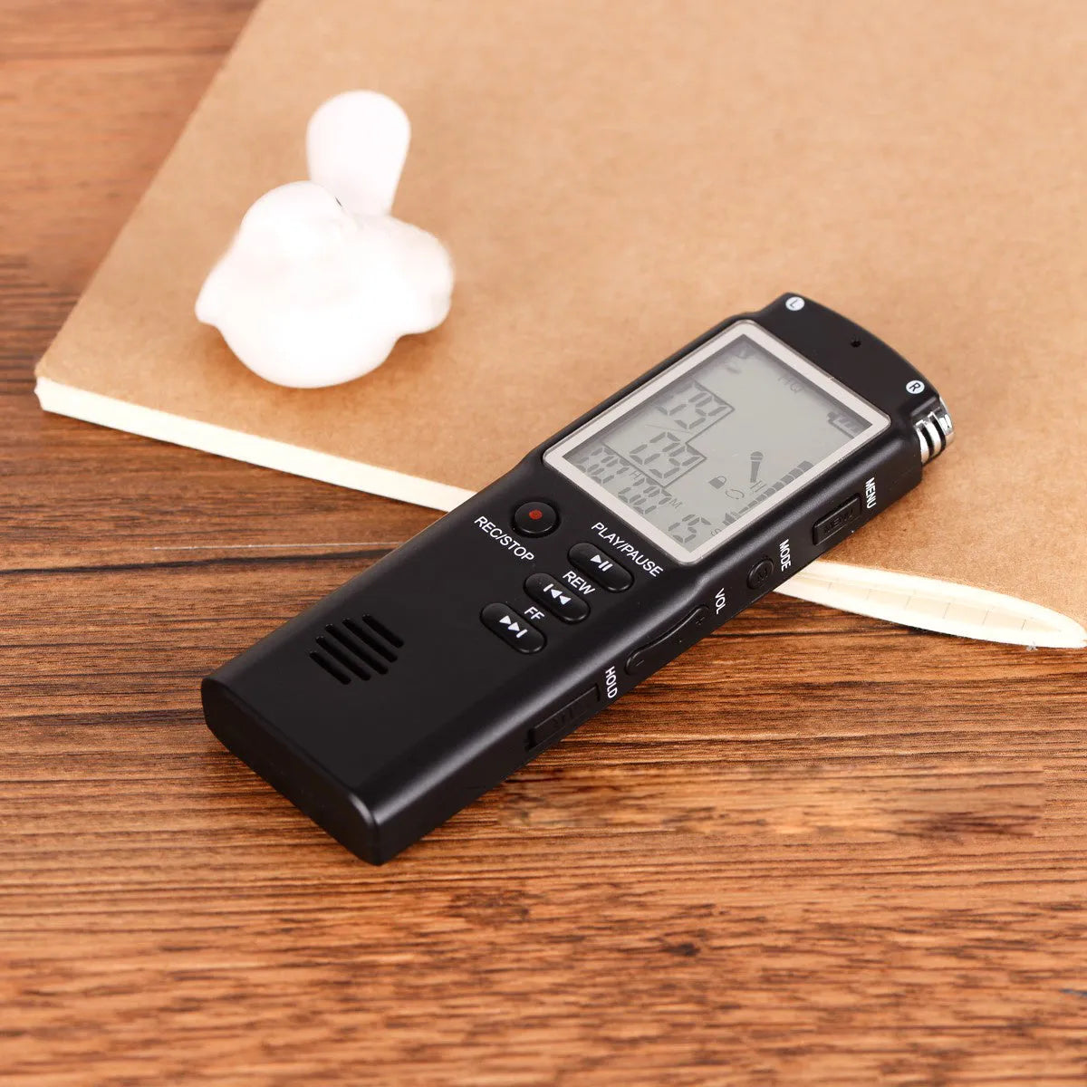 Black USB digital voice recorder for telephone and microphone recording, showing compact size