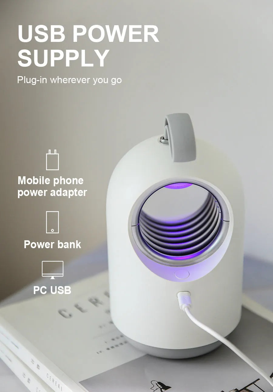 White indoor mosquito killer lamp with blue accents, showing top silicone handle and UV light grid.