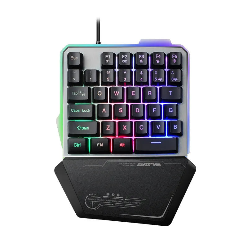 Black robotic one-handed gaming keyboard with RGB backlit keys and USB cable