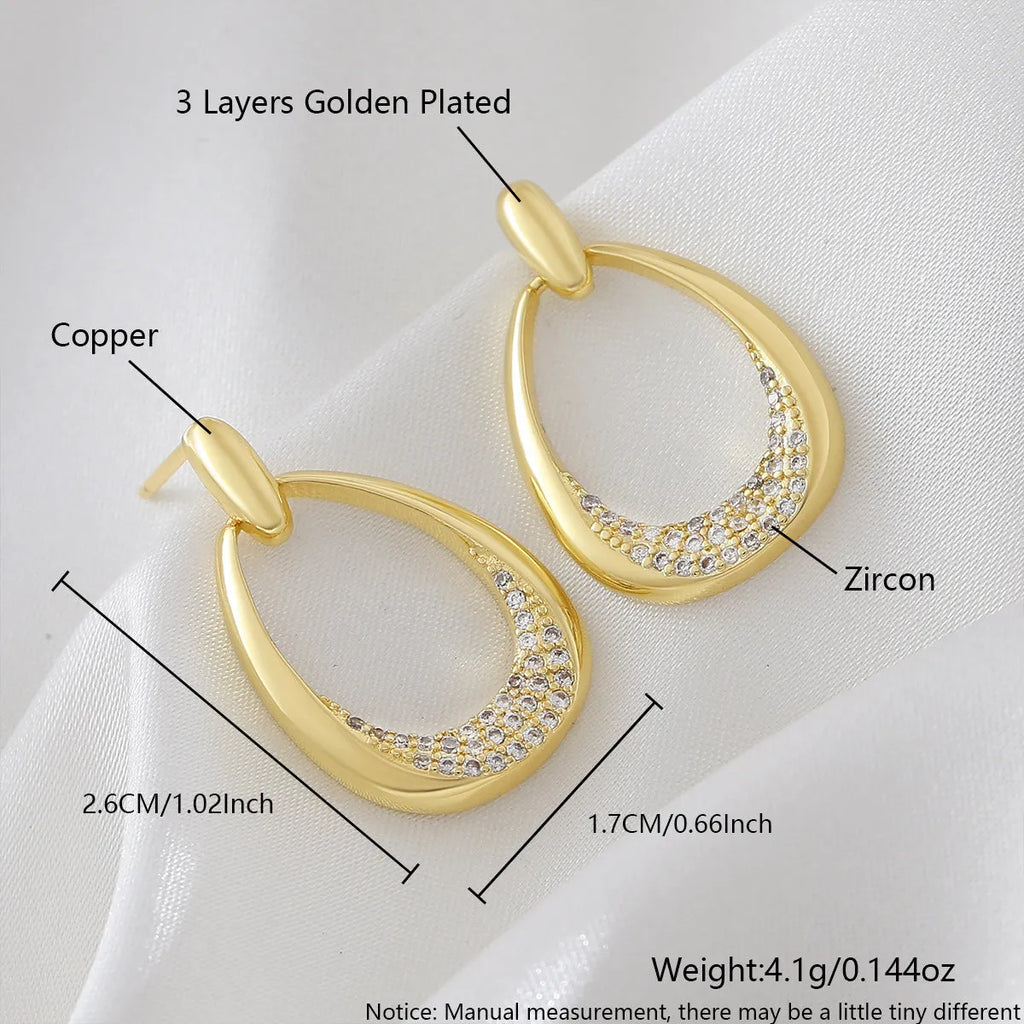 Yellow gold geometric drop-shaped women's copper earrings with colour retention electroplating.