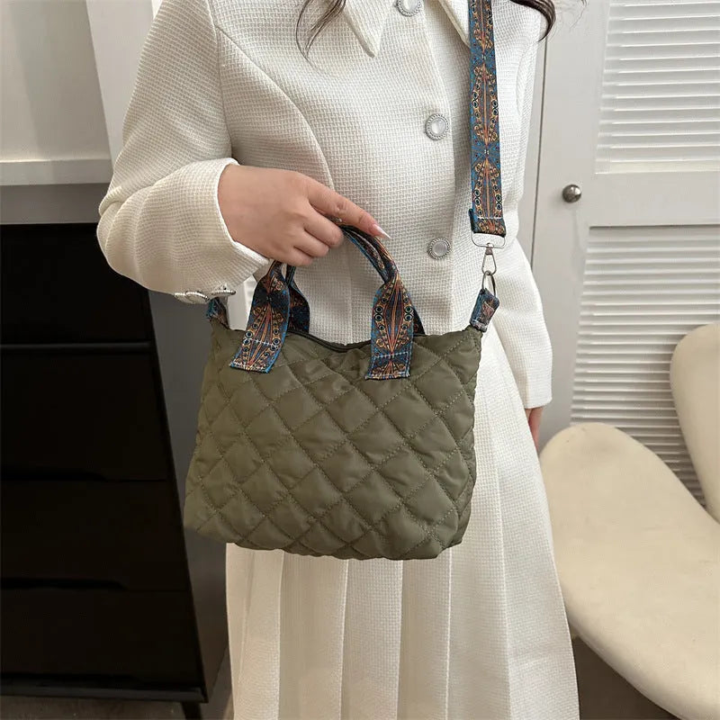 Oxford cloth messenger bag in horizontal square shape with single shoulder strap and sandwich pocket
