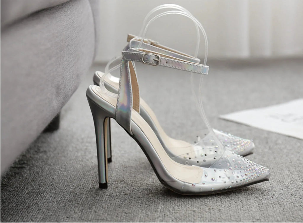 Women's pointed toe sandals with stiletto heel and diamond detail, made from PVC, shown on a size chart.