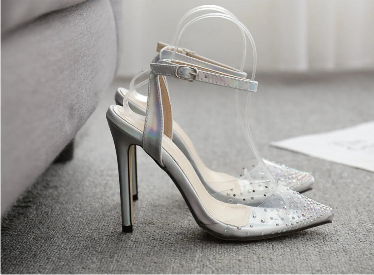 Women's pointed toe sandals with stiletto heel and diamond detail, made from PVC, shown on a size chart.