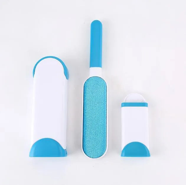 Blue reusable pet hair remover brush with self-cleaning base for removing fur from a grey sofa.