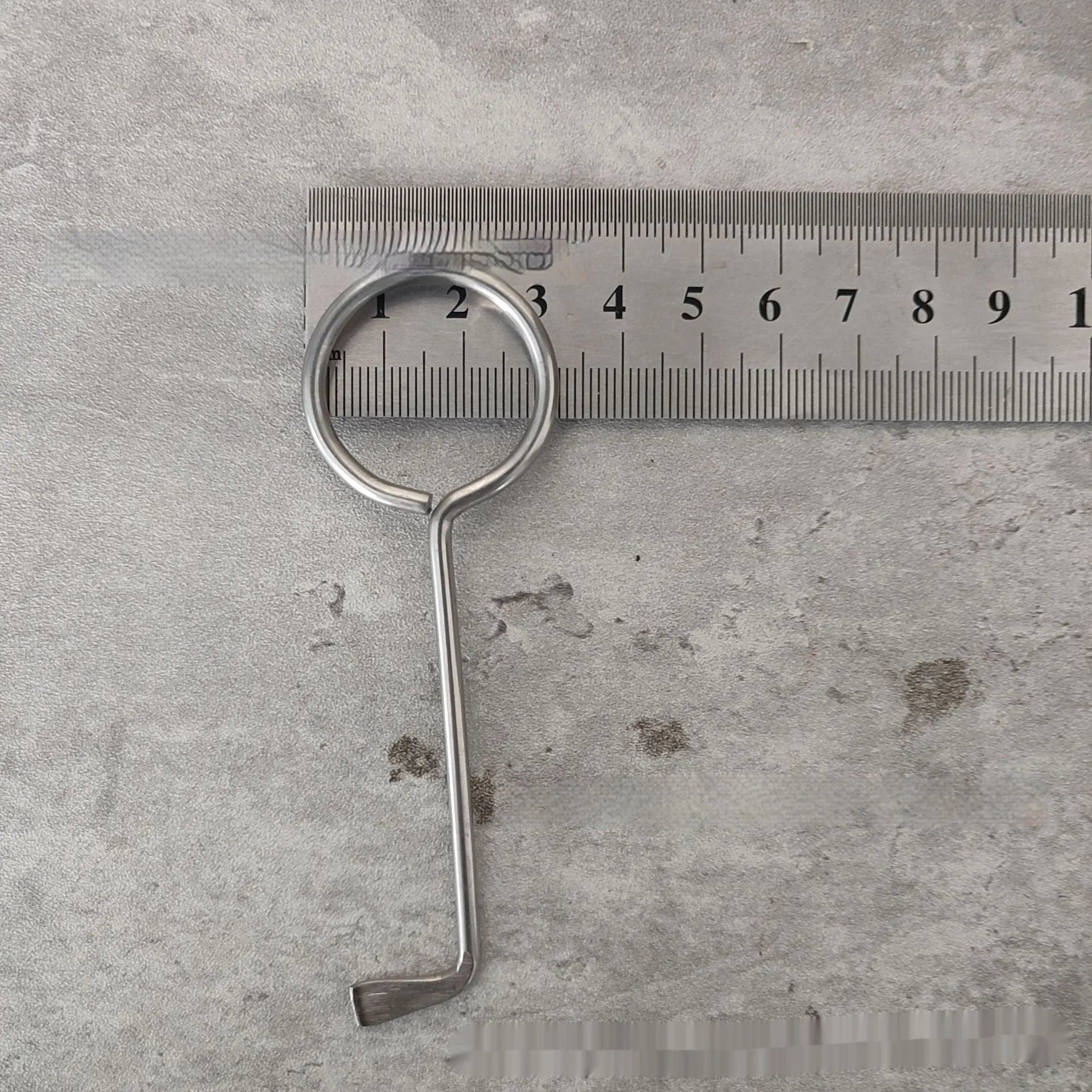 Two metal alloy wrench tools from a portable 2-piece set for household and vehicle maintenance.