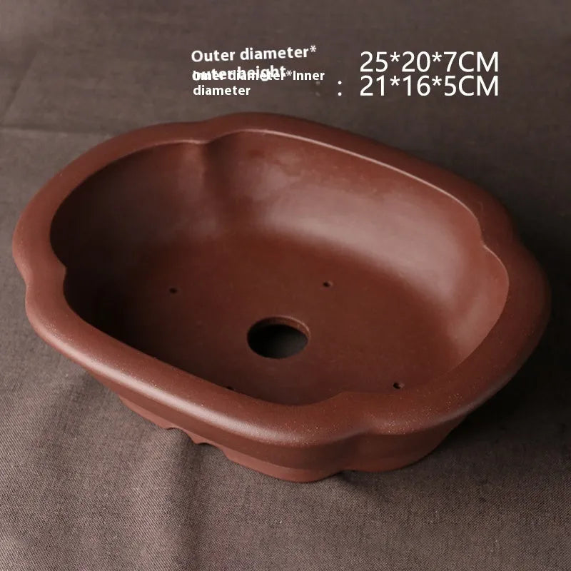 Handmade purple clay bonsai pot with classical Chinese design measuring 25cm long