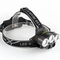 Fixed focus LED head torch with head mount and long-range beam for outdoor camping.