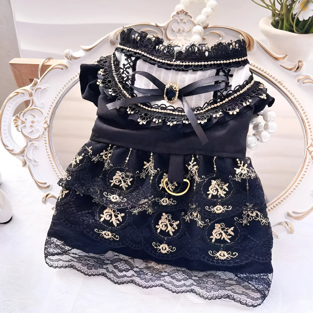 Golden gothic princess style skirt for a small dog on a mannequin, showing the size tag.