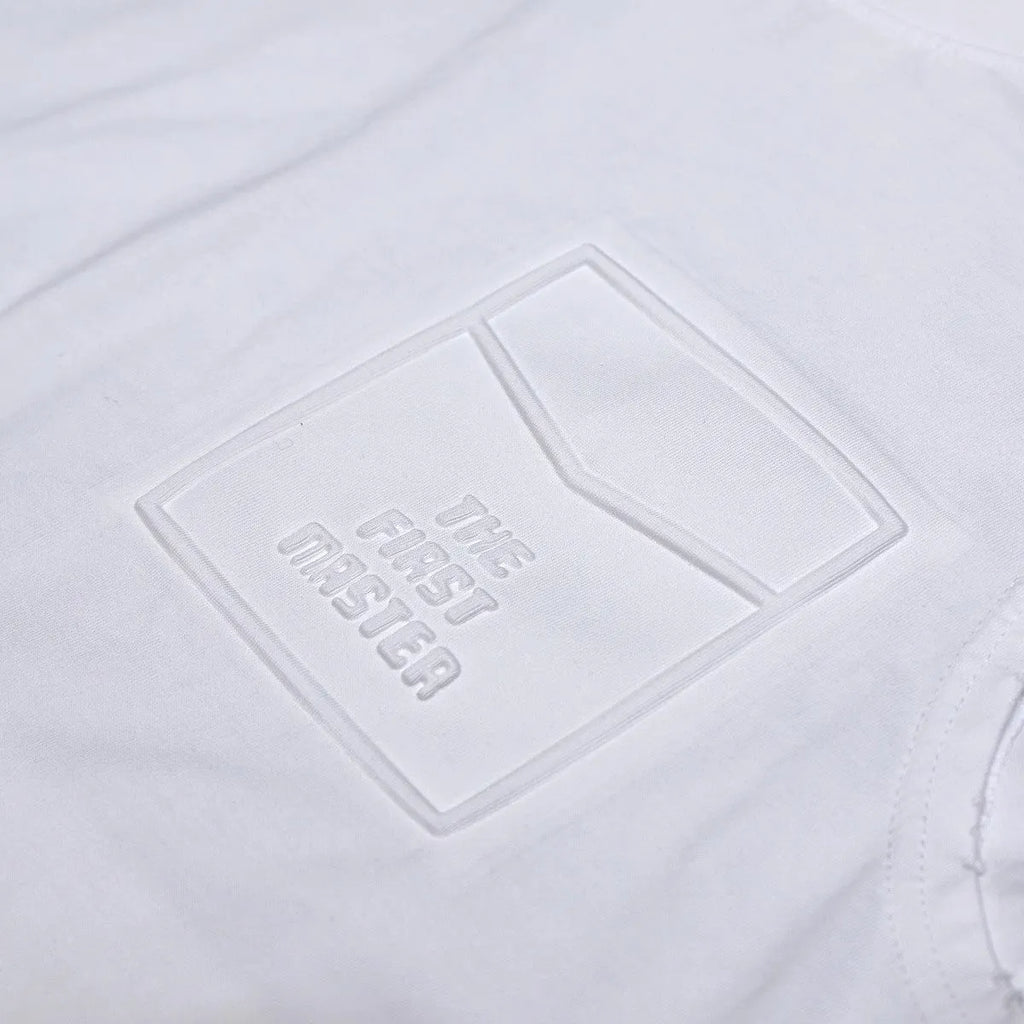 Cotton sleeveless t-shirt in loose fit with straight hem, available in white or black colours