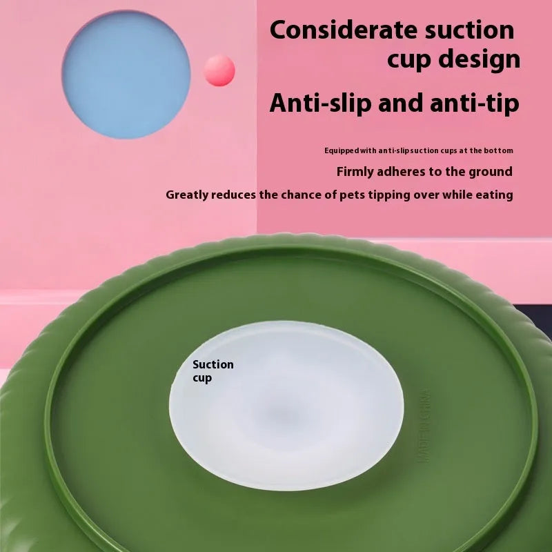 Rotating pet slow feeder bowl with game board surface and removable silicone licking mat in blue.