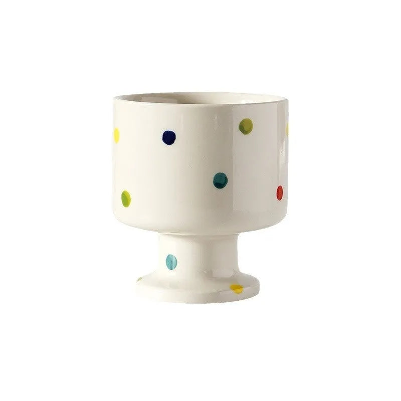 Hand-pinched irregular ceramic mug in solid colour with 250ml capacity