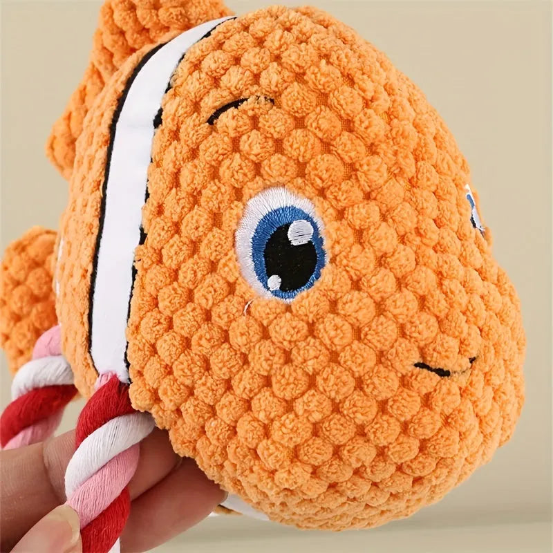 Turtle-shaped plush dog chewing toy with squeaker and hidden knot construction