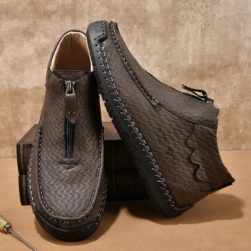 Men's slip-on leather loafers in black with round toe and rubber sole